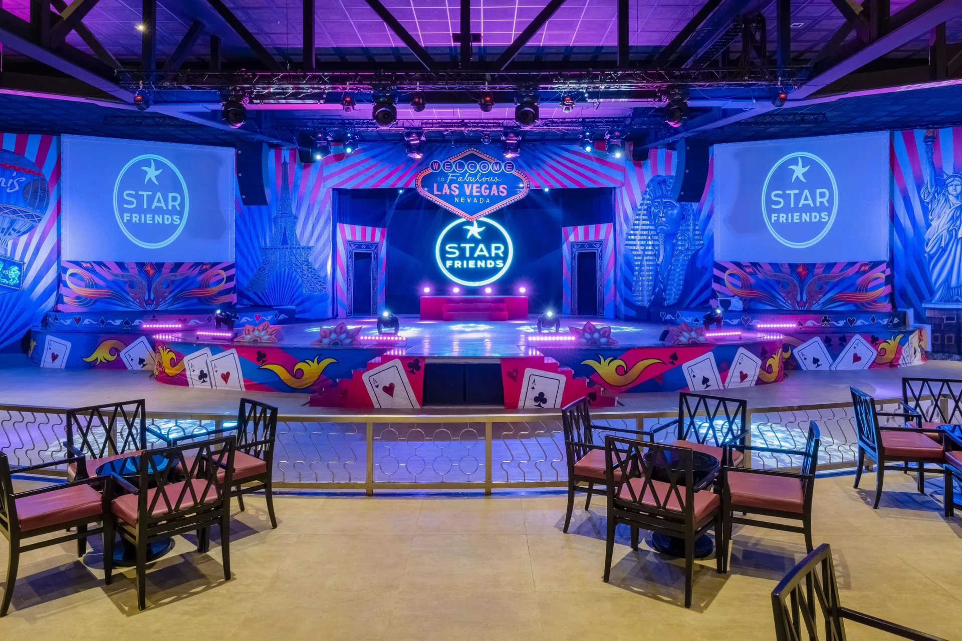 Theater stage with colorful show lighting at Iberostar Selection Playa Mita.