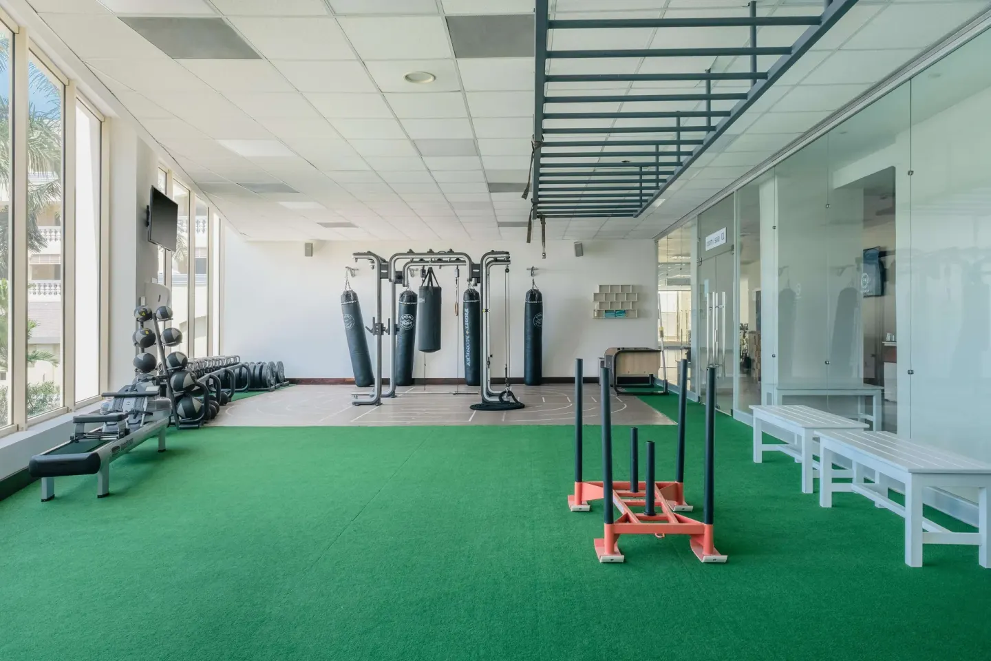 Functional training area with turf and sleds at Iberostar Selection Rose Hall Suites.