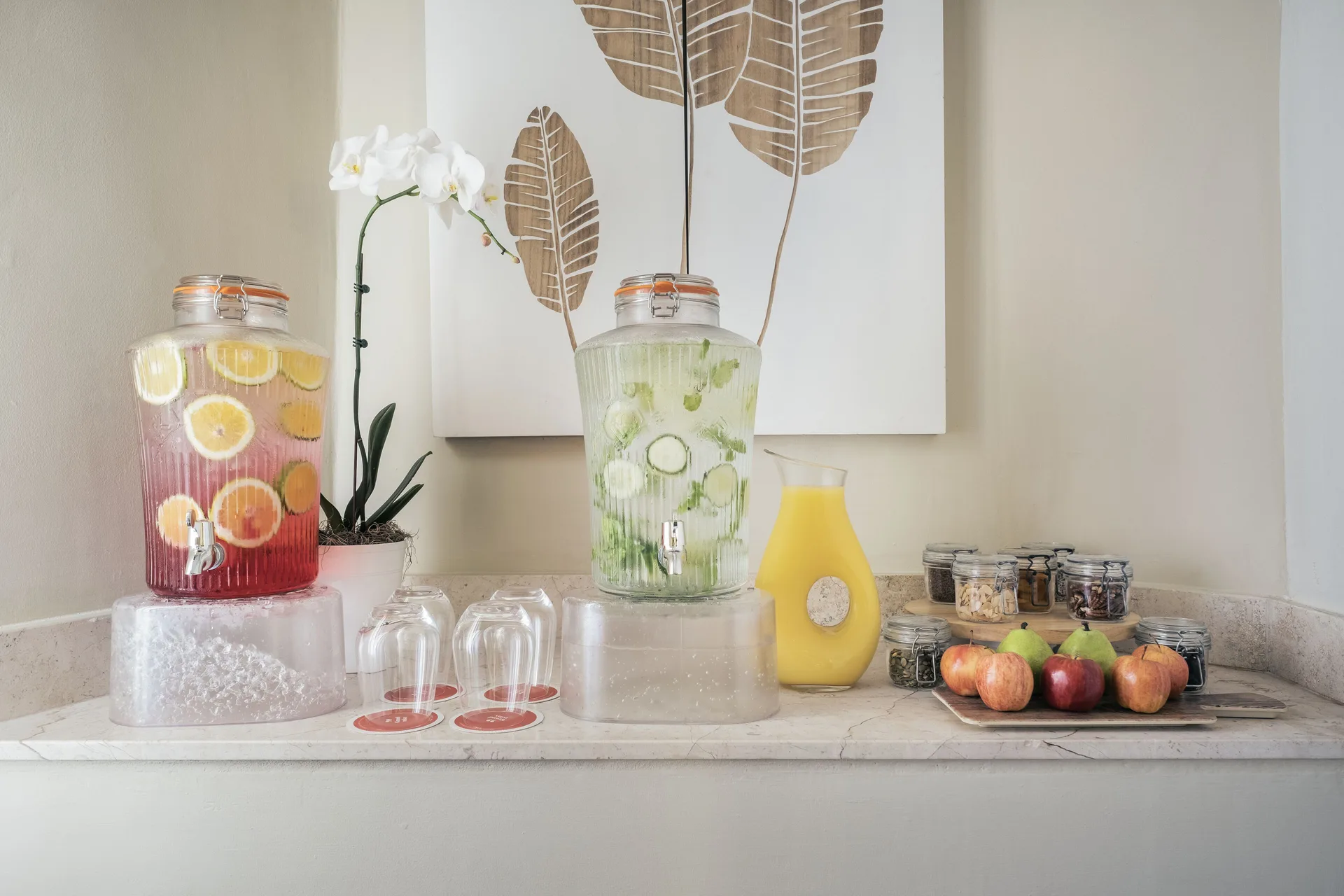 Refreshment station with fruit drinks and snacks at Iberostar Selection Rose Hall Suites.