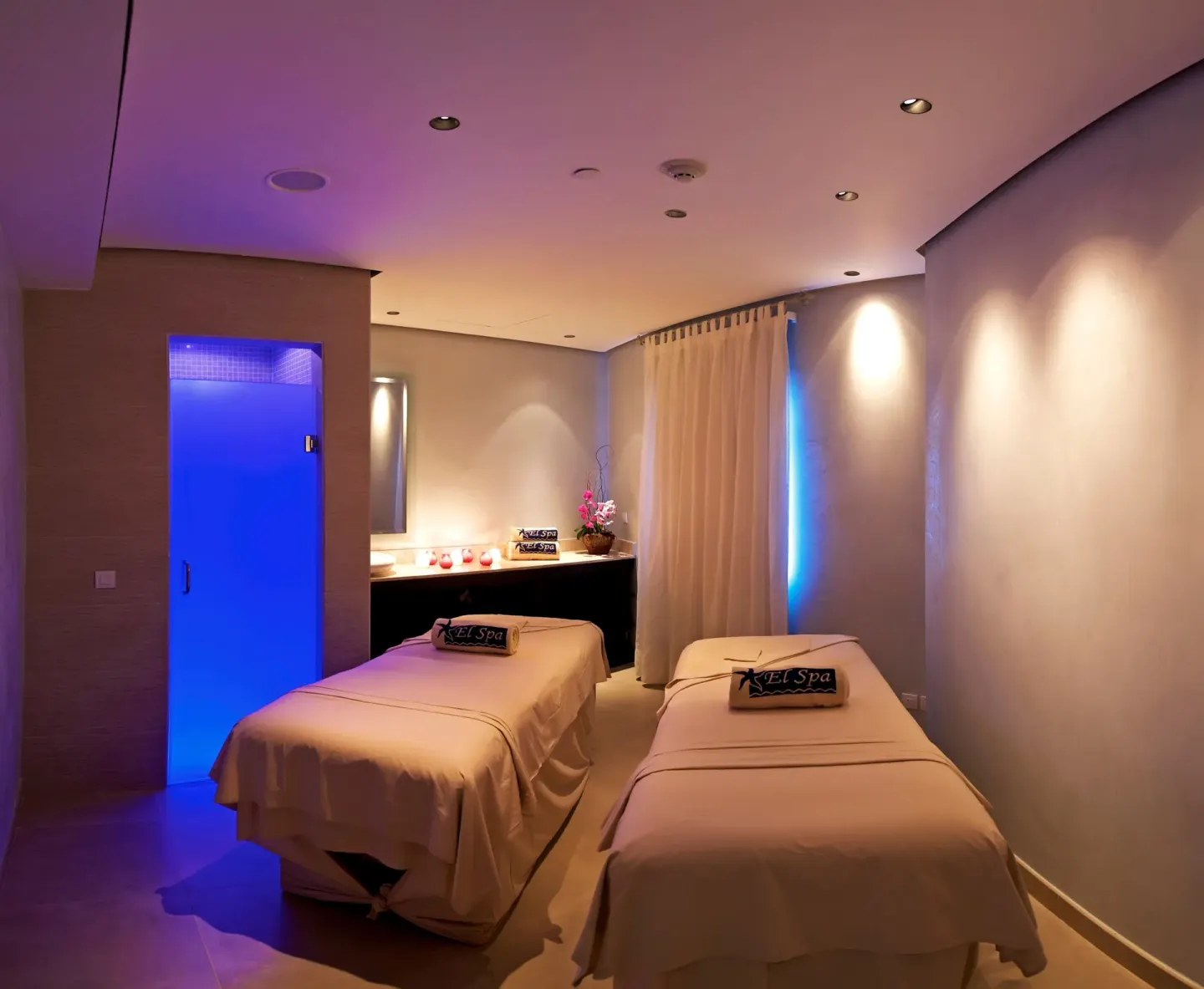 Spa treatment room with two massage beds at Iberostar Selection Rose Hall Suites.