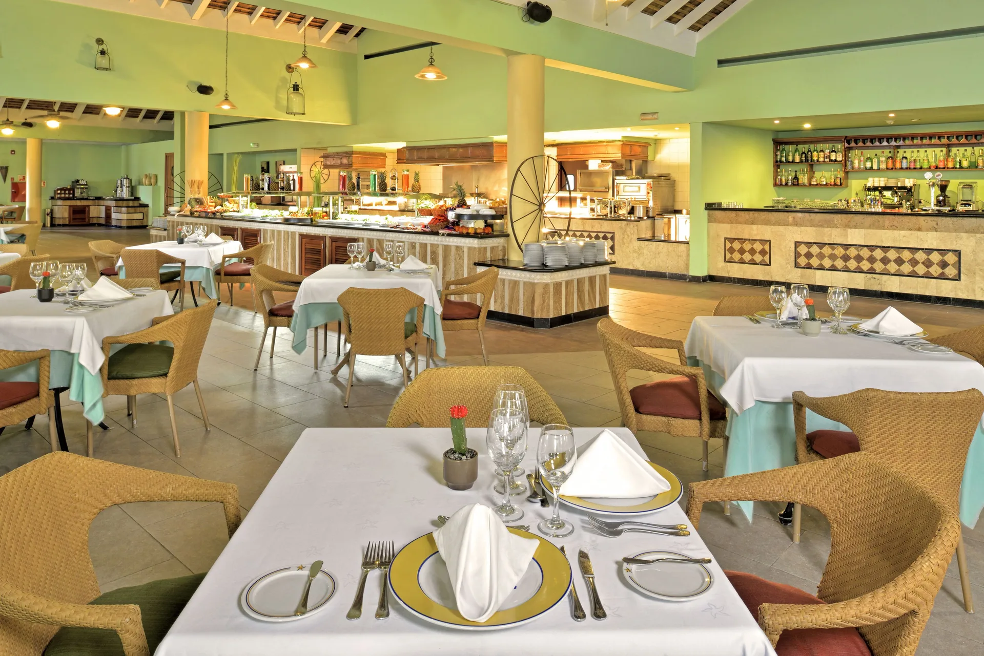 Buffet dining room with set tables at Iberostar Selection Rose Hall Suites.