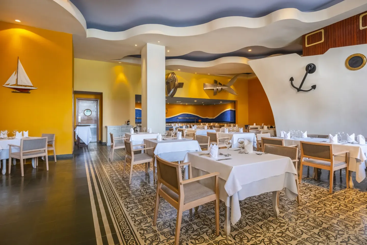 Nautical-themed restaurant dining room at Iberostar Selection Rose Hall Suites.