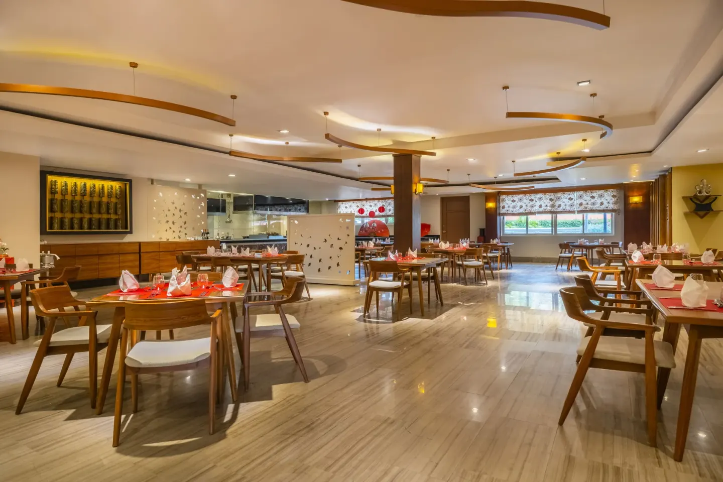 Asian-style restaurant with red place settings at Iberostar Selection Rose Hall Suites.
