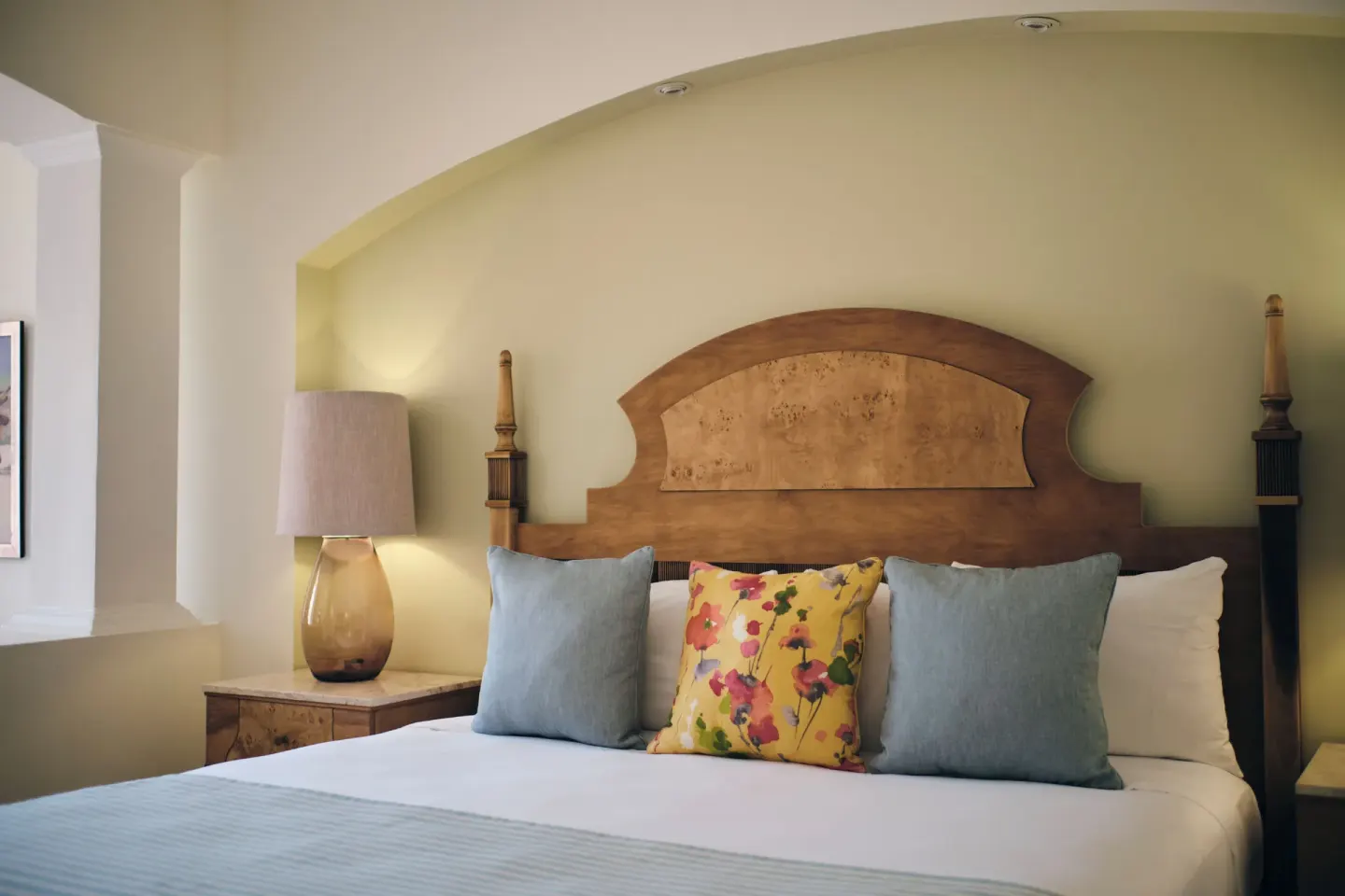 Junior Suite Oceanfront king bed detail at Iberostar Selection Rose Hall Suites.