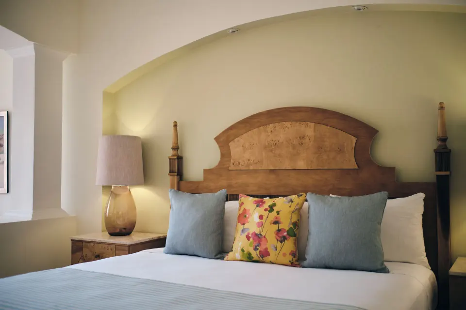Junior Suite Oceanfront king bed detail at Iberostar Selection Rose Hall Suites.