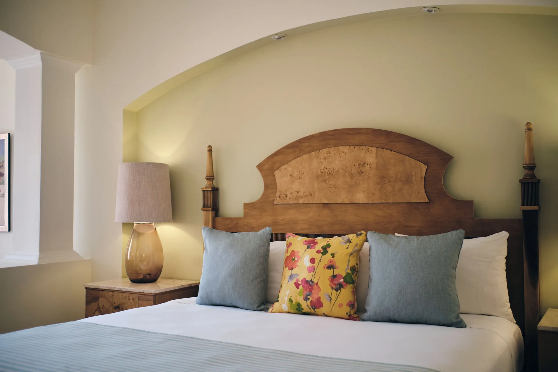 Two Bedroom Family Junior Suite king bed detail at Iberostar Selection Rose Hall Suites with spacious bedroom layout in Montego Bay, Jamaica.