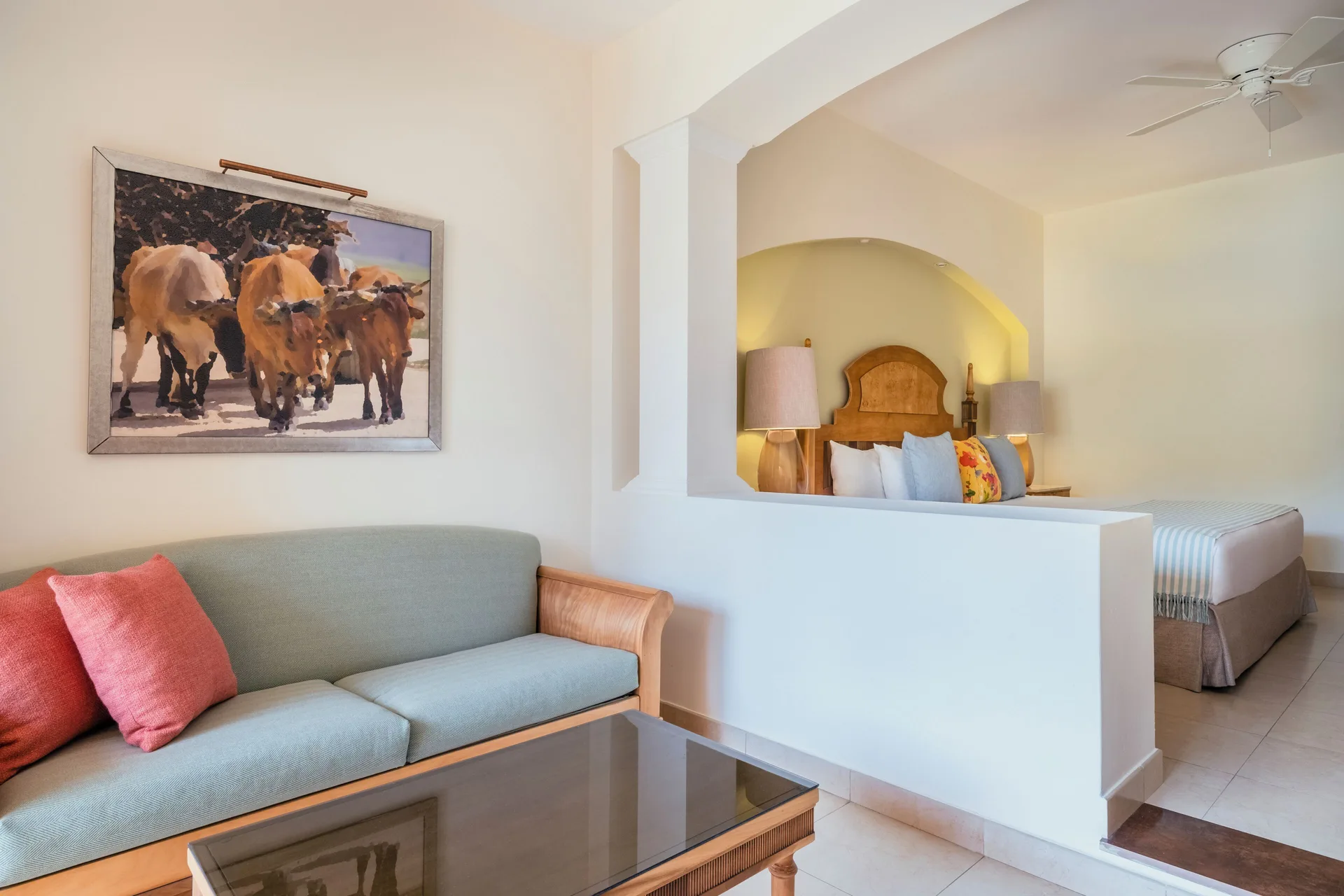 Junior Suite sitting area and bed alcove at Iberostar Selection Rose Hall Suites.