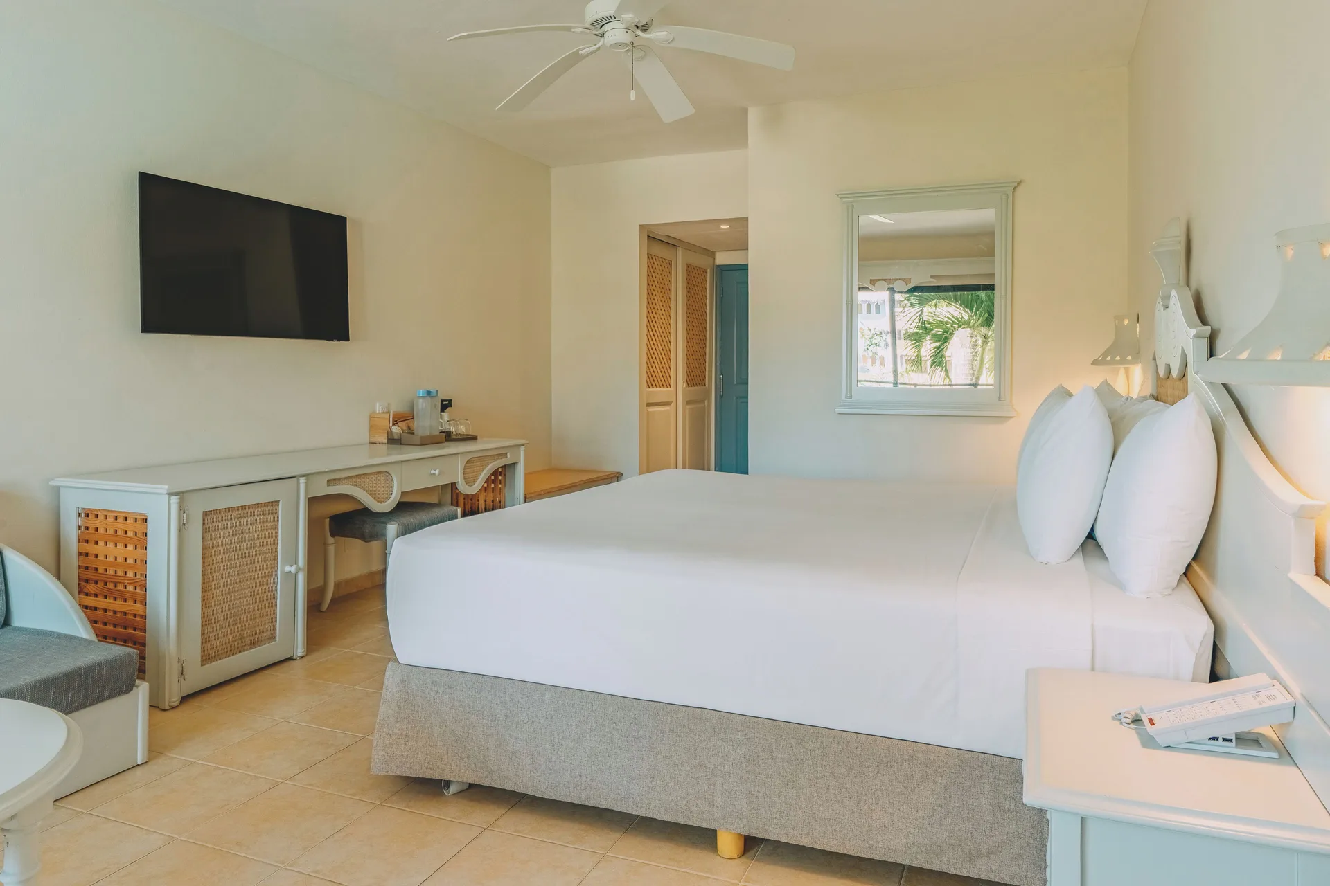 Premium Room Beachside with king bed and TV at Iberostar Waves Costa Dorada.