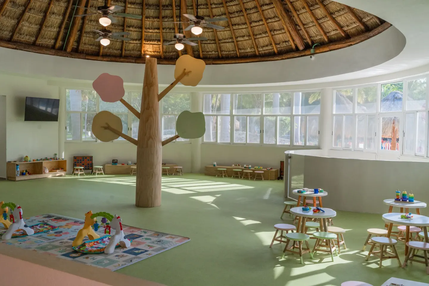 Children's playroom with a tree feature at Iberostar Waves Paraíso Beach.