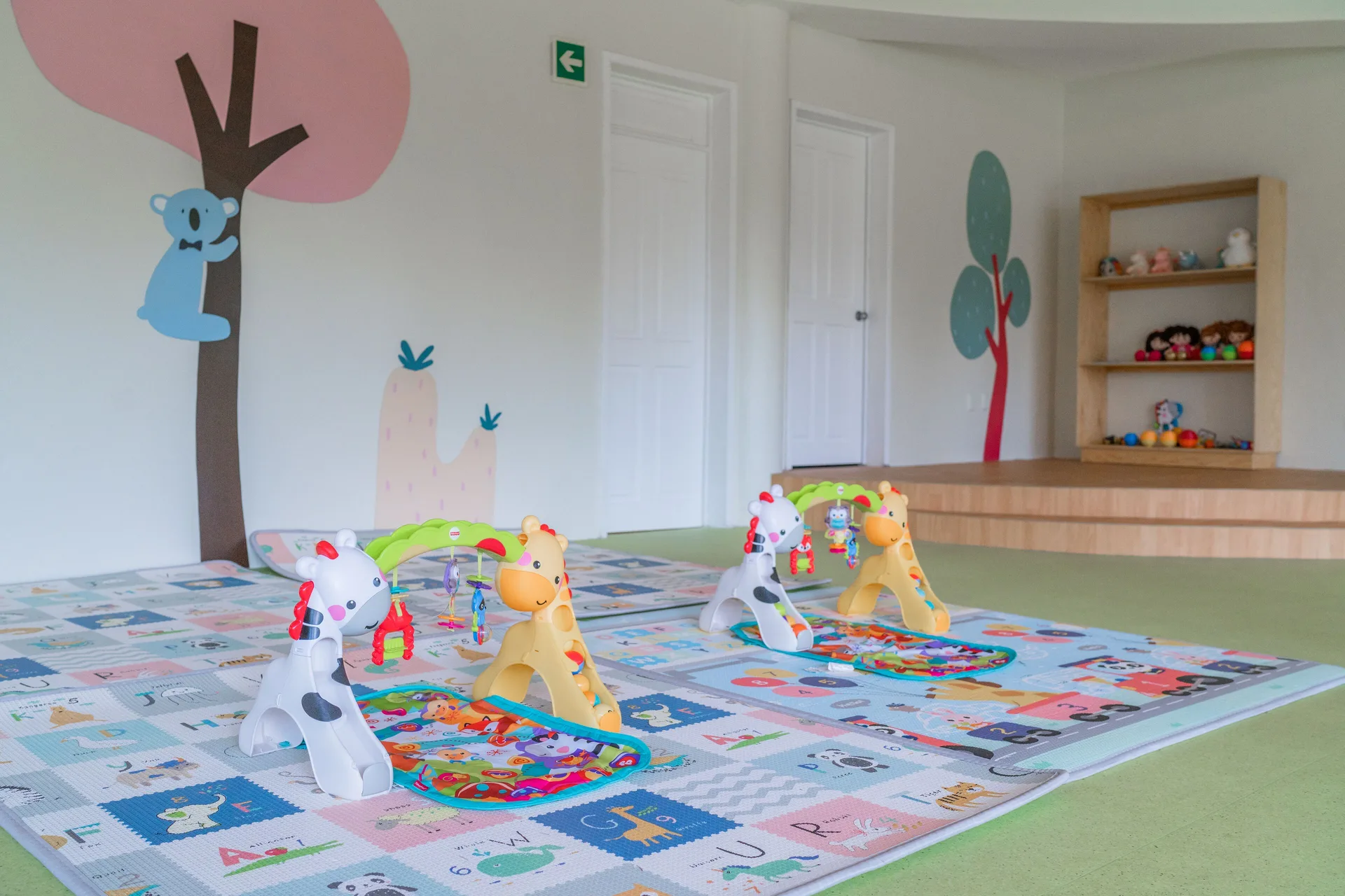 Infant play mats and toys in the kids' room at Iberostar Waves Paraíso Beach.