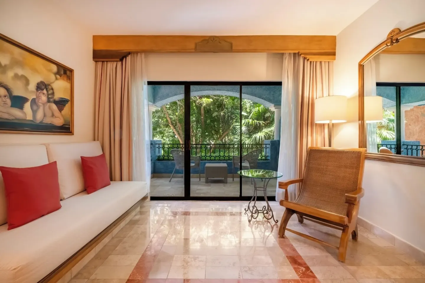 Junior Suite Beachside sitting area and balcony at Iberostar Waves Paraíso Beach.
