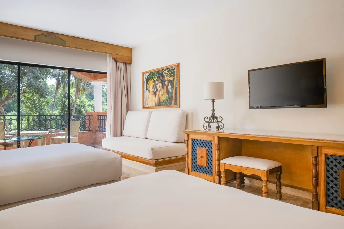 Premium Room with two beds, sofa, TV, and balcony at Iberostar Waves Paraíso Beach.