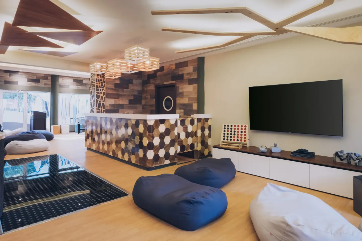 Kids club lounge with beanbags and games at Iberostar Waves Paraíso del Mar.