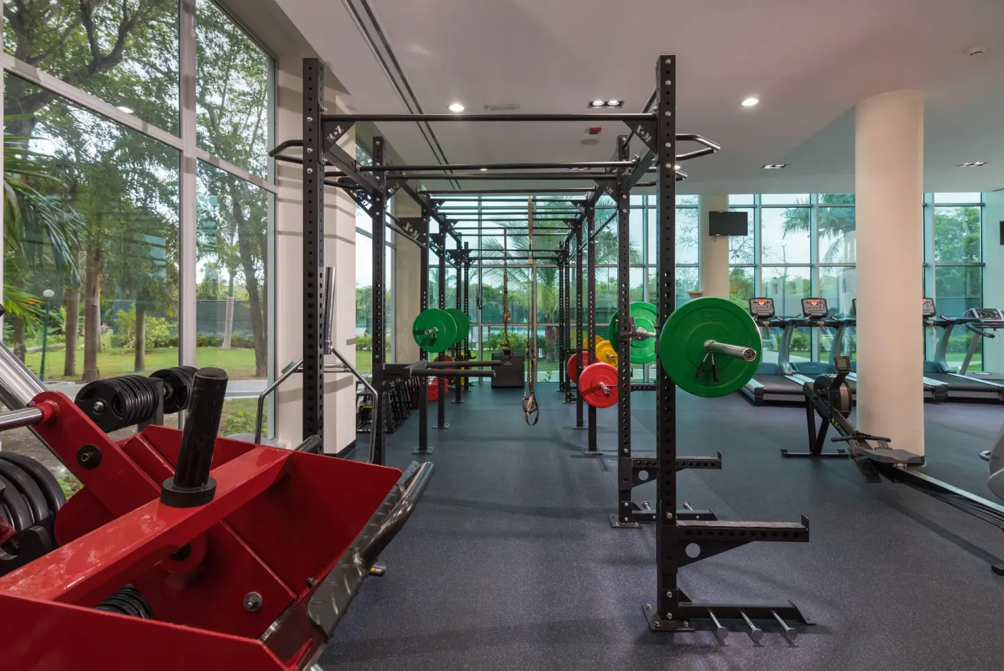 Strength training area with racks and weights at Iberostar Waves Punta Cana.