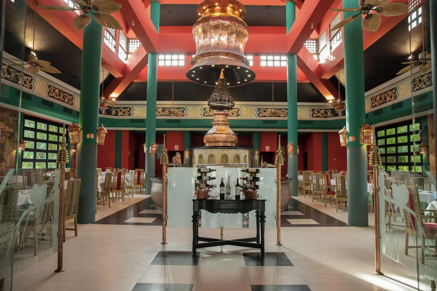 Colorful restaurant interior with high ceiling at Iberostar Waves Punta Cana.