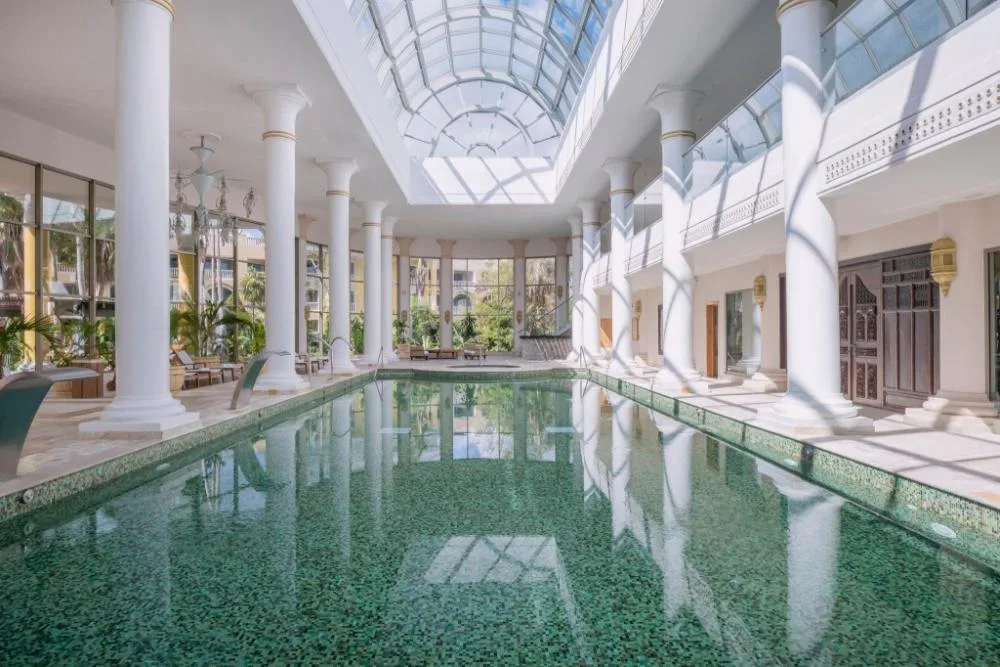 Iberostar Grand Hotel Paraiso adults-only luxury Iberostar all-inclusive resort with grand architecture and formal pool gardens in Riviera Maya, Mexico.