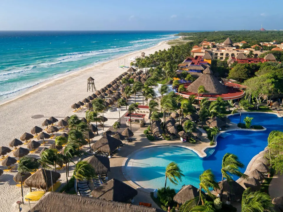Iberostar Waves Quetzal family-friendly all-inclusive sister resort with tropical gardens and beachfront pool in Playa del Carmen, Mexico.