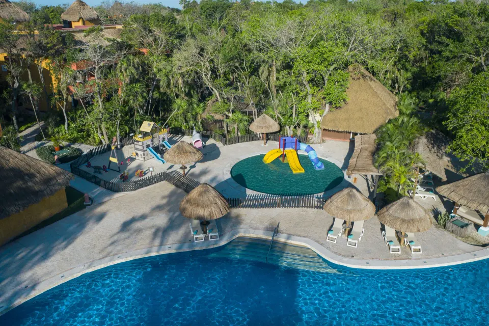 Aerial shot of the kids' splash area and nearby pool at Iberostar Waves Tucán