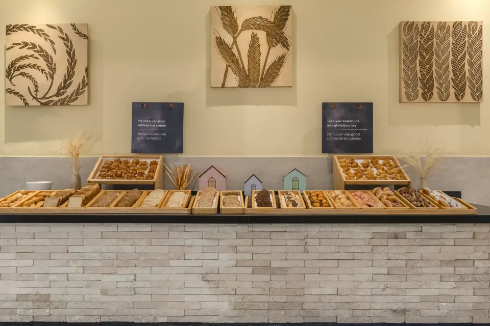 Pastry and bread buffet display at Iberostar Waves Tucán