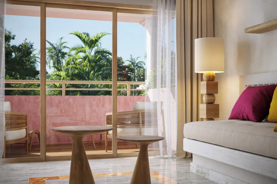 Balcony seating and sliding door from junior suite at Iberostar Waves Tucán