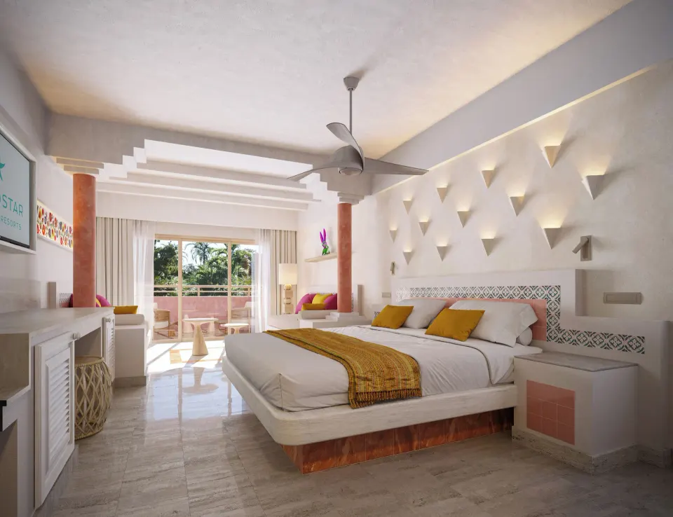 Bright Junior Suite with king bed and balcony at Iberostar Waves Tucán