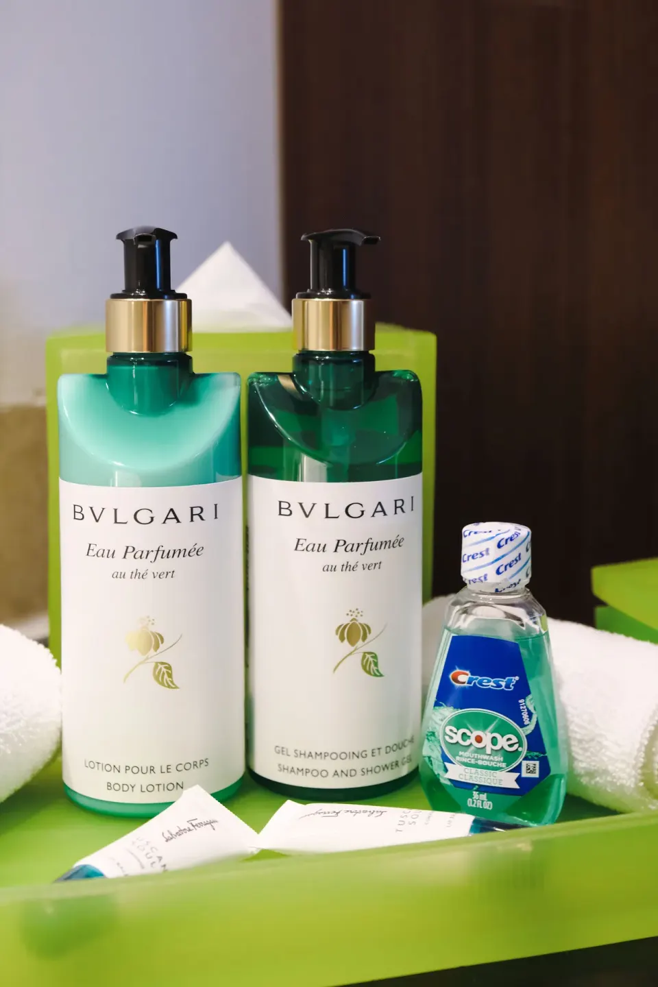 Close-up of bath amenities on a green tray at InterContinental Presidente Cancun Resort.