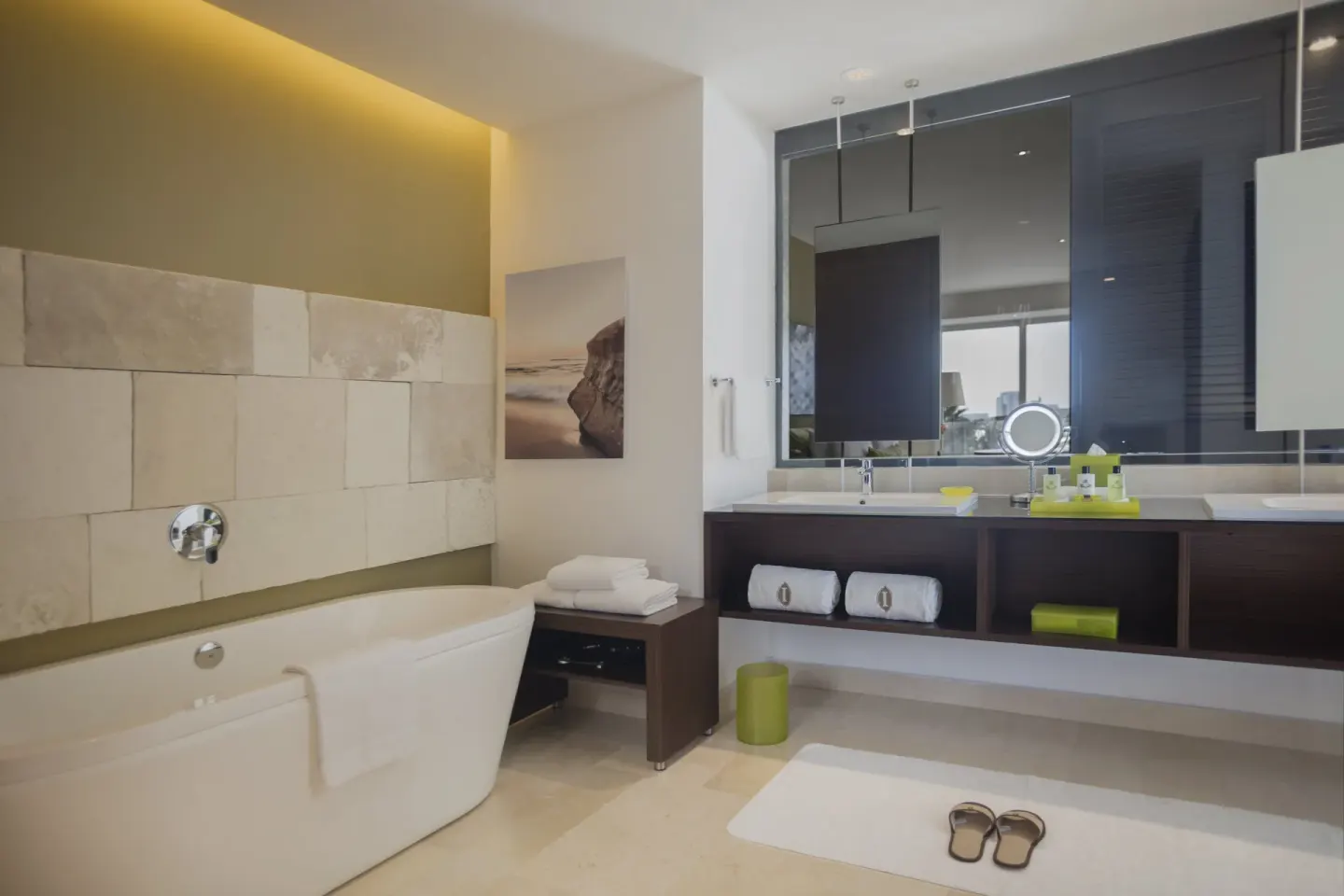 Guest bathroom with soaking tub and double vanity at InterContinental Presidente Cancun Resort.