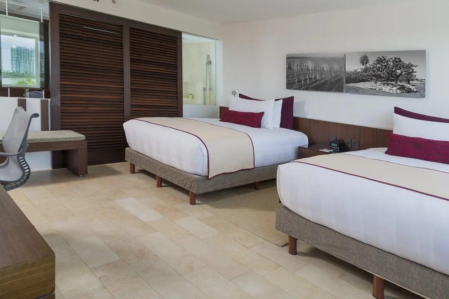Double-bed guest room with desk at InterContinental Presidente Cancun Resort.