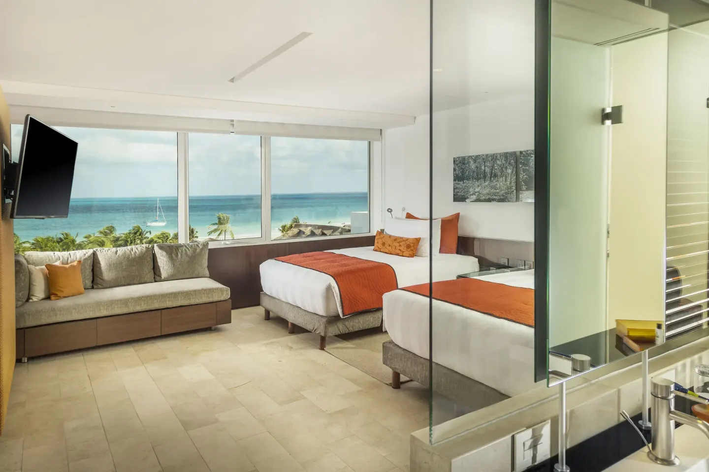 Two-bed ocean-view guest room at InterContinental Presidente Cancun Resort.