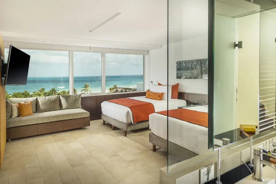 Two-bed ocean-view guest room at InterContinental Presidente Cancun Resort.