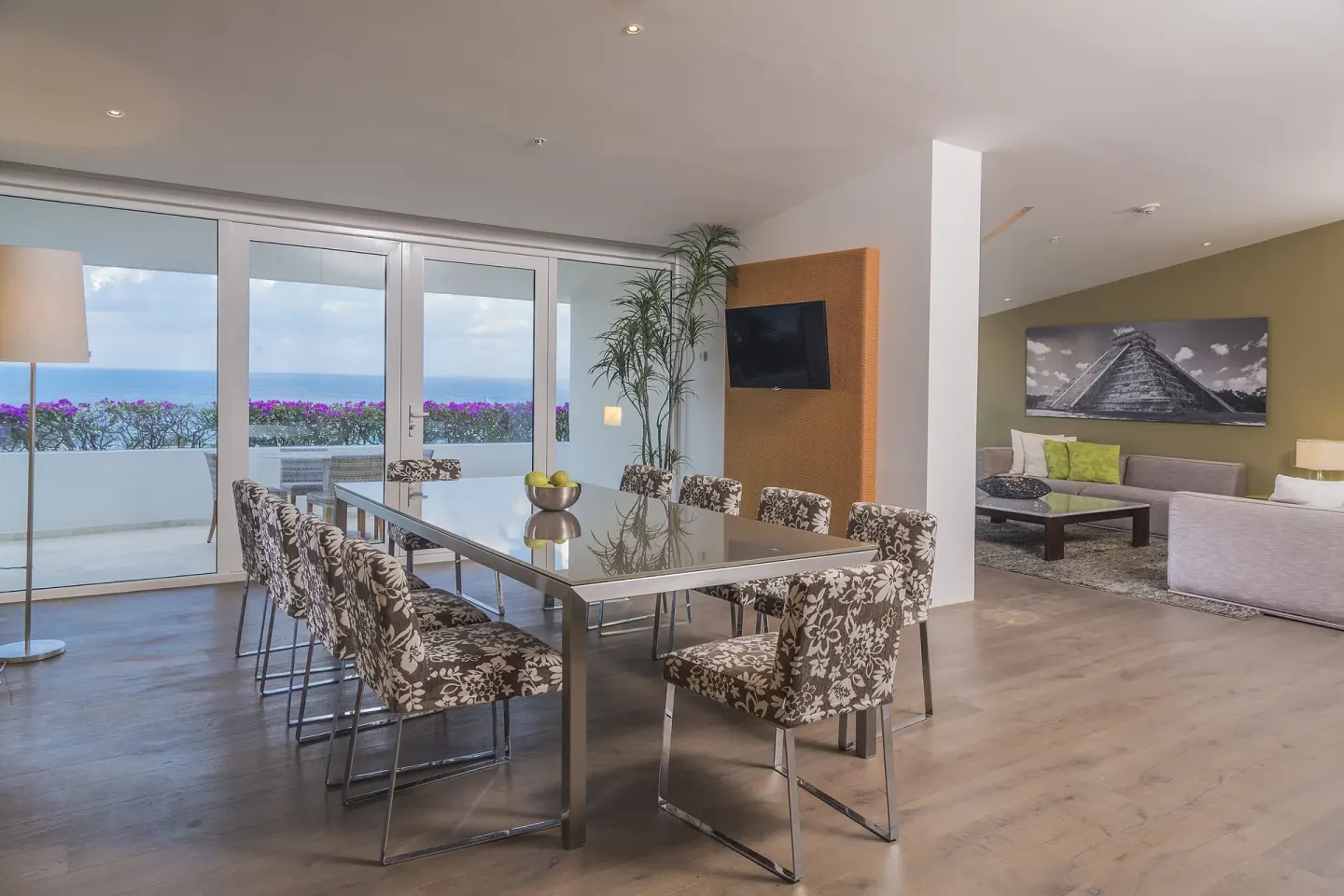 Suite dining and living area with ocean view at InterContinental Presidente Cancun Resort.