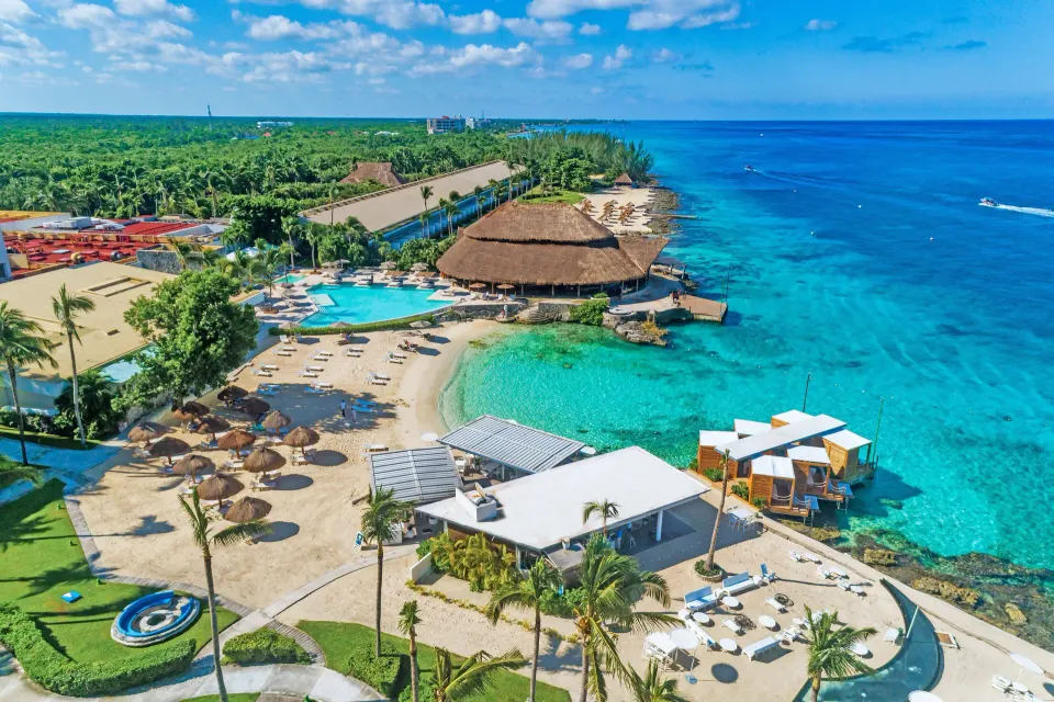 Aerial view of resort coastline and overwater cabanas at InterContinental Presidente Cozumel Resort Spa