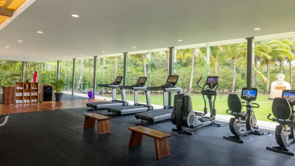 Resort fitness center with treadmills and cardio machines at InterContinental Presidente Cozumel Resort Spa