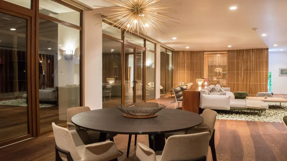 Seating and dining area with floor-to-ceiling glass at InterContinental Presidente Cozumel Resort Spa