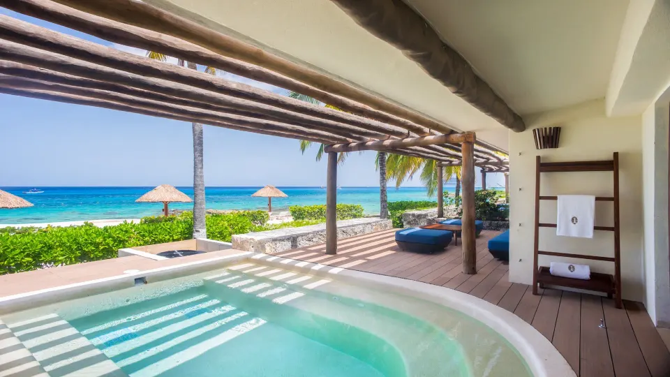Private terrace with small plunge pool and ocean beyond at InterContinental Presidente Cozumel Resort Spa