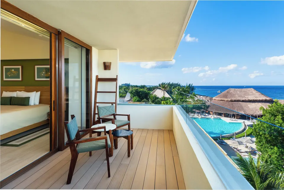 Balcony view from junior suite overlooking pool and sea at InterContinental Presidente Cozumel Resort Spa
