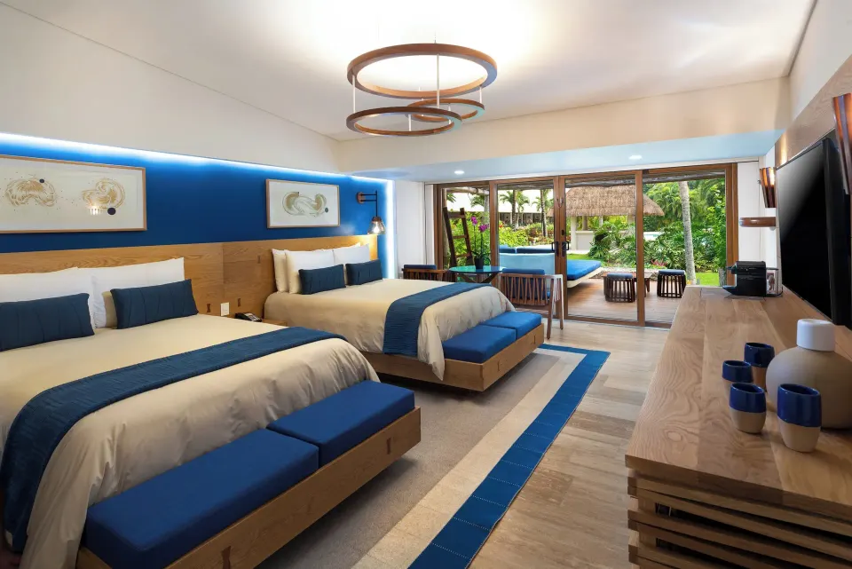 Premium Room Pool Access with two beds and patio overlooking gardens at InterContinental Presidente Cozumel Resort Spa