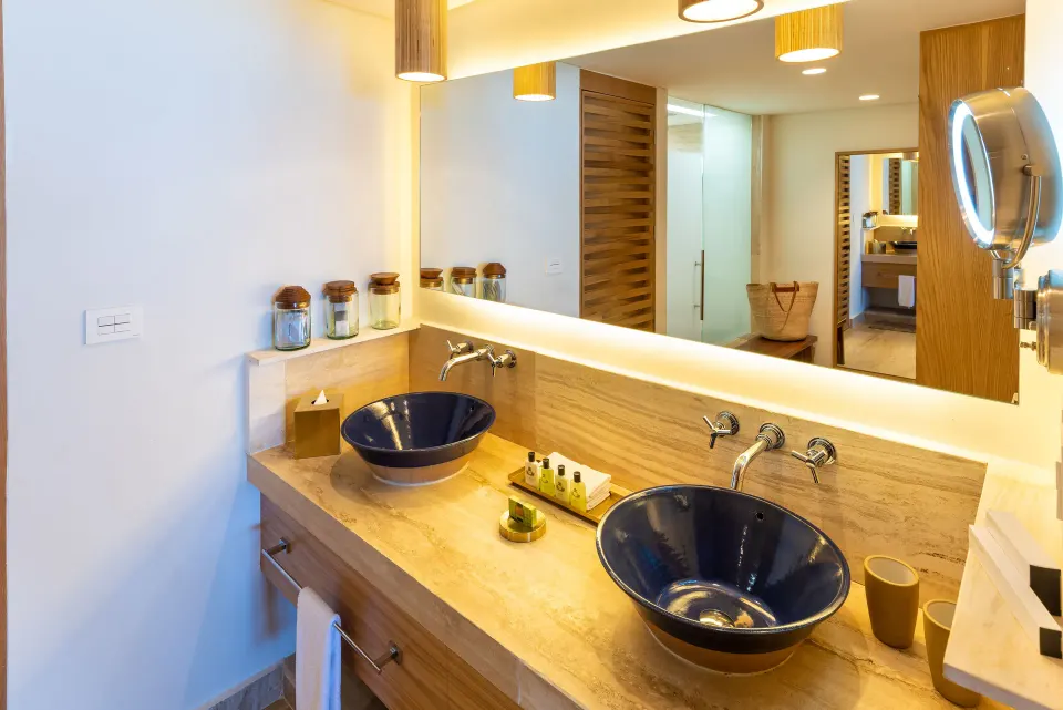 Bathroom vanity with twin vessel sinks in a Premium Room at InterContinental Presidente Cozumel Resort Spa