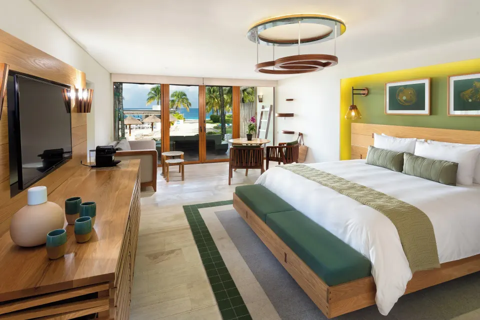 Seafront Premium Room with king bed and sliding glass doors to the beach at InterContinental Presidente Cozumel Resort Spa