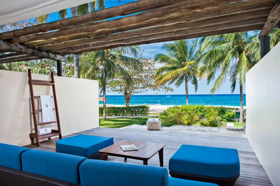 Private terrace with blue seating, pergola and ocean view at InterContinental Presidente Cozumel Resort Spa