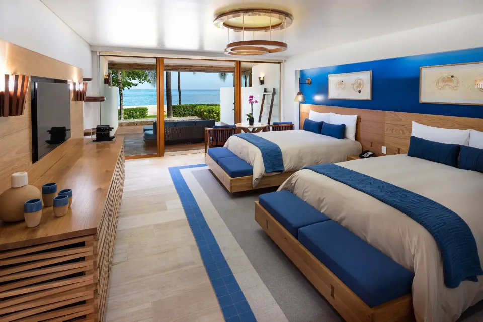 Resort premium room with twin beds facing terrace and ocean at InterContinental Presidente Cozumel Resort Spa