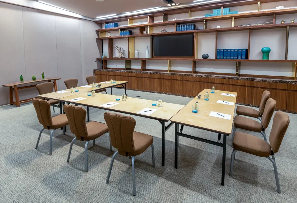 Boardroom-style meeting with U-shaped tables and chairs at InterContinental Presidente Cozumel Resort Spa