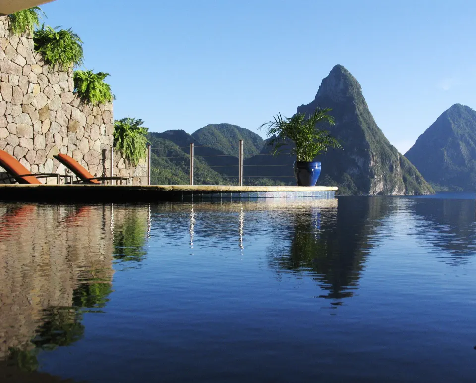 Moon Suite pool terrace with loungers and Piton reflections at Jade Mountain Resort.