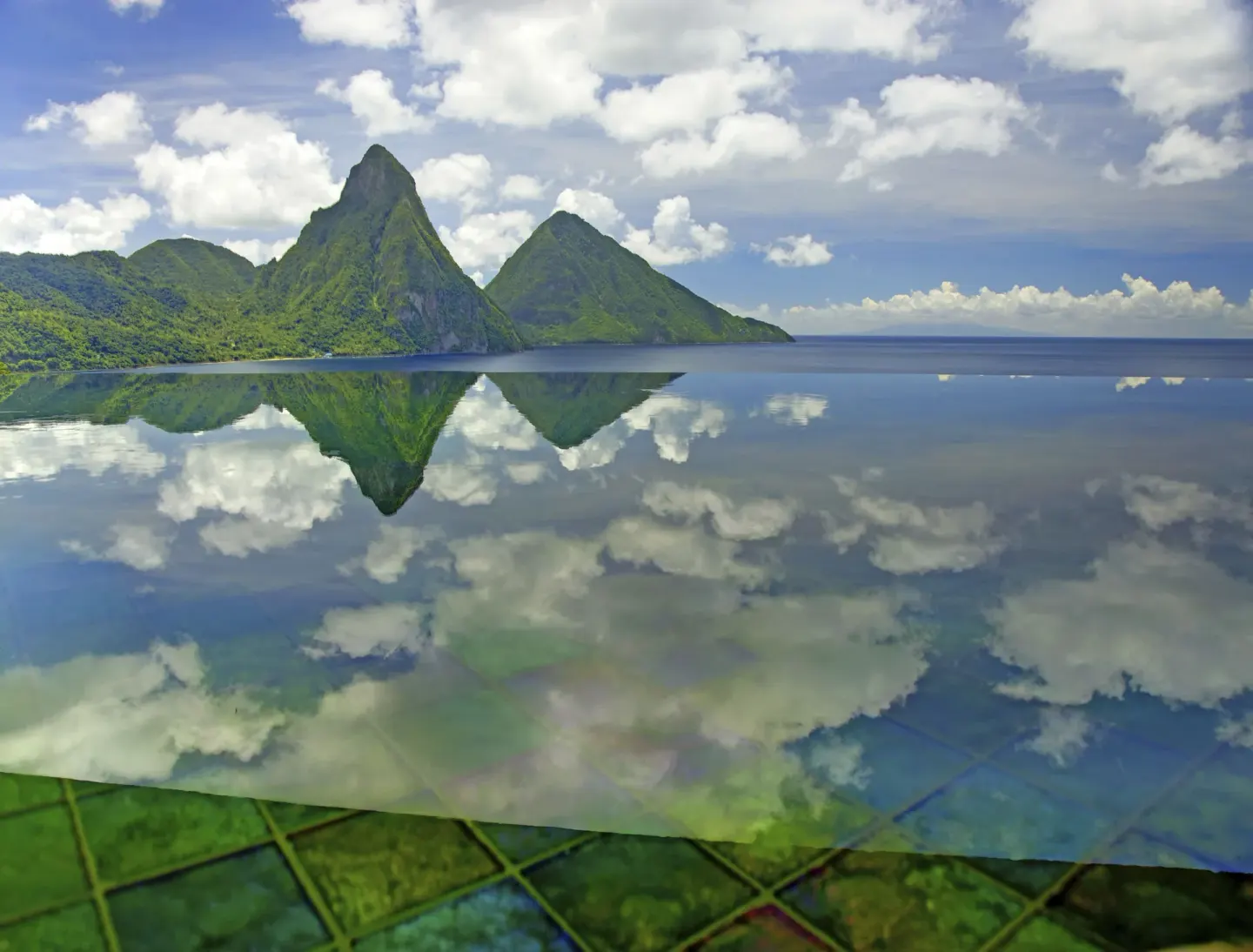 Star suite infinity pool reflecting the Pitons at Jade Mountain Resort.