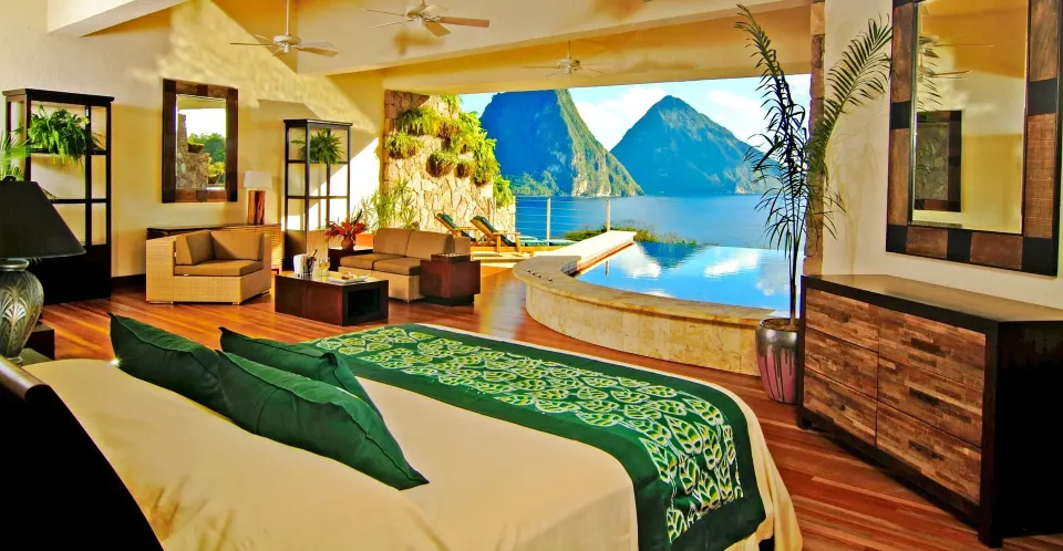 Star suite bedroom with king bed and infinity pool at Jade Mountain Resort.