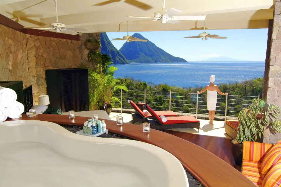 Sun suite bath, terrace loungers and Piton view at Jade Mountain Resort.