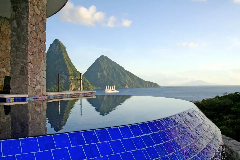 Sun suite infinity pool with blue tile edge and Piton view at Jade Mountain Resort.