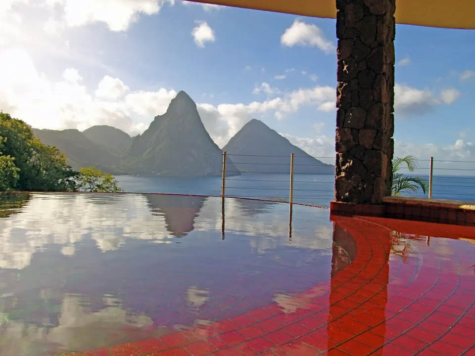 Sun suite infinity pool reflecting clouds and Pitons at Jade Mountain Resort.