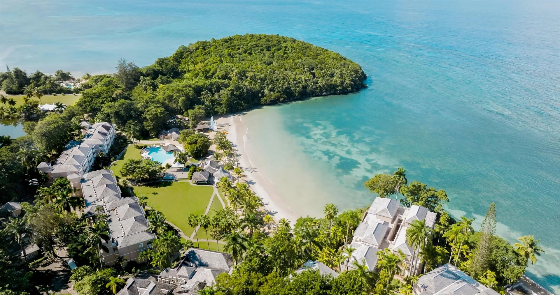 Couples Sans Souci adults-only all-inclusive resort with lush gardens, mineral pools and beachfront cliffs