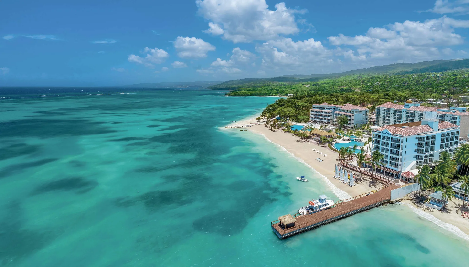 Sandals Dunns River adults-only couples resort with all-inclusive dining, pools and modern beachfront design